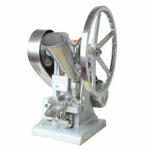 Single punch tablet press